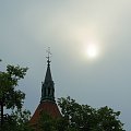 widoczek ze słońcem za chmurami-wieża kościoła #Olsztyn